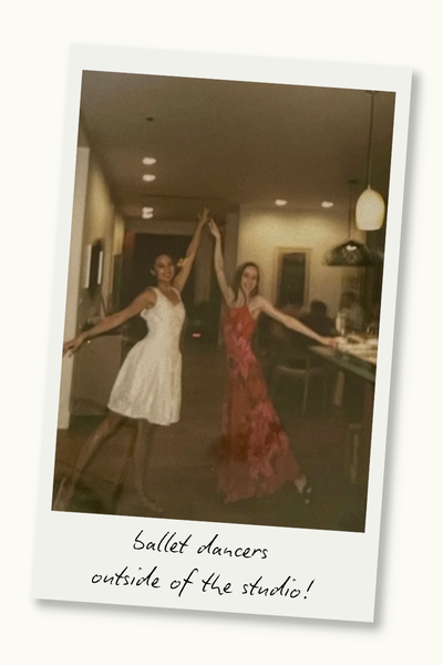 Two women pose in ballet arabesques in a house. A Polaroid frame surrounds the photo, and text on the frame reads "ballet dancers outside of the studio!"